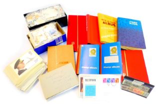 A quantity of stamps, stock albums, including c200 Royal Mail postcards, contained in eight albums a