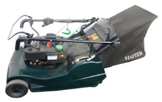 A Briggs and Stratton Hayter Harrier 56 petrol mower.