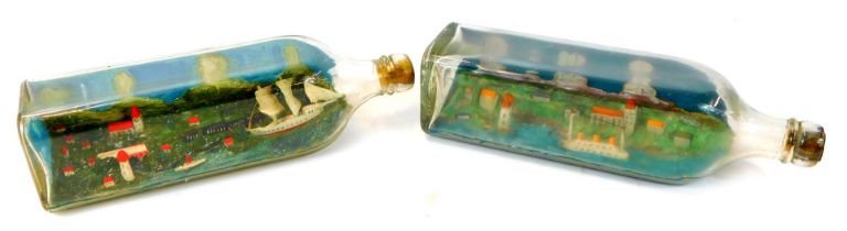 Two diorama ship scenes within bottles, possibly Scandinavian scenes, with ships and harbours, etc,