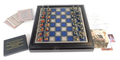 A Waterloo Museum The Battle of Waterloo chess set, the blue and silver coloured chequered chess boa