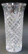 An Edinburgh Crystal cut glass vase, of cylindrical form, with flared neck, 22cm high, boxed.