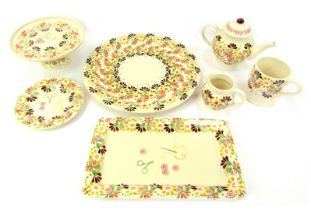 A group of Emma Bridgewater Sewing Design pattern pottery, comprising 13" cake plate, two mug teapot