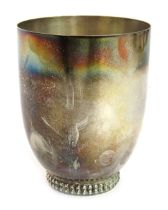 A Wilkens white metal drinking cup, of plain design on double beaded base, marked Wilkens 835, 9cm h