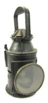 A black painted railway lantern, 36cm high.