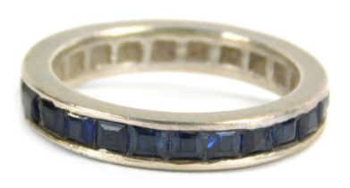 A sapphire full eternity ring, white metal, unmarked, 3g all in.