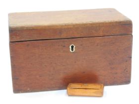 A 19thC mahogany tea caddy, of rectangular plain form, the hinged lid enclosing two lidded compartme