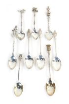 A group of silver and white metal coffee spoons, to include three with apostle terminal, Sheffield a