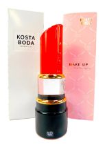 A Kosta Boda makeup glass sculpture by Asa Jungnelius, modelled as a lipstick, 21cm high, boxed with