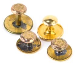 A cased part set of gentleman's collar studs, each marked rolled gold, three of floral engraved desi