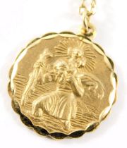 A 9ct gold pendant and chain, the St Christopher circular pendant reverse inscribed with a car and a