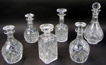 A group of cut glass decanters, to include two decanters of bottle form with stoppers, each 21cm hig