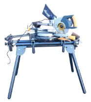 An Evolution mitre saw, R255PTS, with instruction booklet, together with an Evolution mitre saw stan