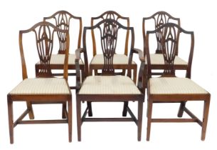 A set of six Hepplewhite style mahogany dining chairs, with Regency stripe drop in seats, on square