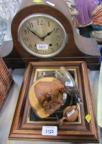 An oak cased Napoleon's hat mantel clock, a quartz movement pocket watch picture, wooden carvings, e