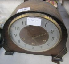 An oak cased mantel clock, with Arabic numeral dial, eight day Westminster chime, 23cm high.