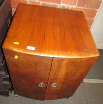 A mid century two door record cabinet, 62cm high, 50cm wide, 50cm deep.
