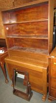 A mahogany open bookcase, together with an oak drop leaf table, and a swing frame mirror. (3)