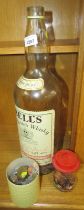 A Bells Scotch whisky bottle, 4.5l, containing various coinage, Elizabeth II copper, five pence piec