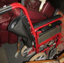 A folding wheelchair.