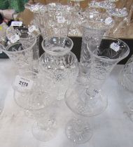 Cut glass vases, to include inverted trumpet examples, the largest 20cm high.