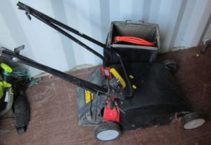 A Dolmar electric lawn mower.