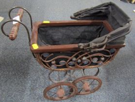 A wicker and steel doll's pram.