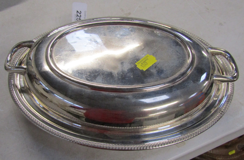 A Squirrel Brand EPNS oval dish and cover, 29cm wide.
