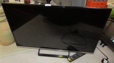 A Panasonic Viera flat screen 31" television, with remote.