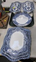 A late 19thC/early 20thC blue and white transfer printed part dinner service, to include two tureens