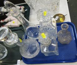 Five glass decanters, differing styles.
