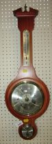 A banjo wall barometer, 67cm high.