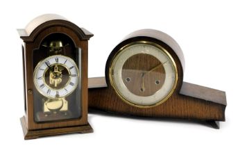 A 1950s/60s oak cased mantel clock with Westminster chime, and a Continental mantel clock in a mahog