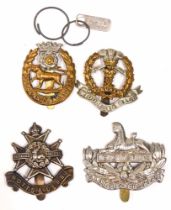 Various cap badges, Middlesex, Gloucestershire, Notts and Derby, and other regiment cap badges.