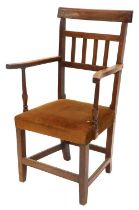 Withdrawn pre-sale. A 19thC yew open armchair, with rail back, shaped arms and a padded seat, on