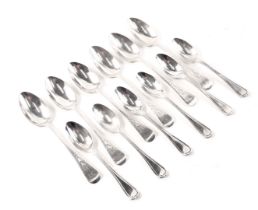 Twelve silver teaspoons, comprising a set of six fiddle pattern and thread topped Victorian silver t