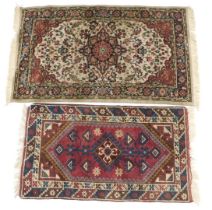 A Turkish pattern rug, with a pole medallion, 132cm x 75cm, and a Belgian Kadjar machine woven rug,