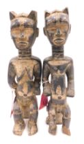 A pair of Dan wedding figures, Cote D'Ivoire, approx 85 years old, 51cm high.