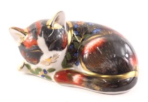 A Royal Crown Derby porcelain Catnip Kitten paperweight, gold button and Collectors Guild red back s
