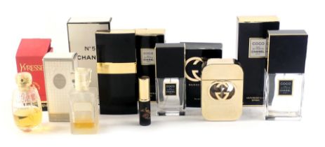 A quantity of partially used and empty perfume bottles, comprising Chanel No.5, Miss Dior, Yvresse,