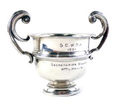 A George V silver trophy cup, with fluted handles inscribed SCWBA dated 1951, Secretaries Winner Mrs