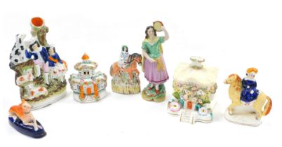 A collection of 19thC Staffordshire figures, etc., to include a pastel burner figure of a lady with