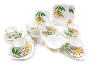 A Tuscan Hawaiian Flowers Bird of Paradise pattern part tea service, to include cups, saucers, side