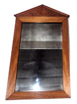 A 19thC mahogany wall mirror, with arched top and distressed mirror plate, 66cm high, 38cm wide.