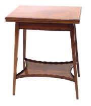 An Edwardian mahogany and satinwood cross banded card table, the square top hinged to reveal a green