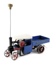 A Mamod steam wagon in blue and red livery, 40cm long.