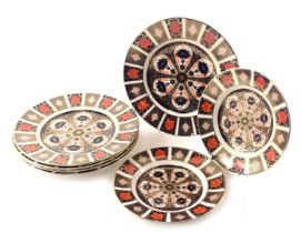 Royal Crown Derby Imari plates, comprising five large dinner plates, and two medium plates.