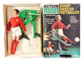An Action Man sharp-shooter footballer, with red and white football kit, boxed.
