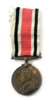 A George V medal for faithful service in the special constabulary, inscribed Charles H Carter, on bl