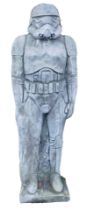 A reconstituted garden statue modelled in the form of a Storm Trooper, 83cm high.