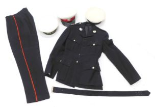 A Royal Marine Forces volunteer reserve dress suit, and various hats.